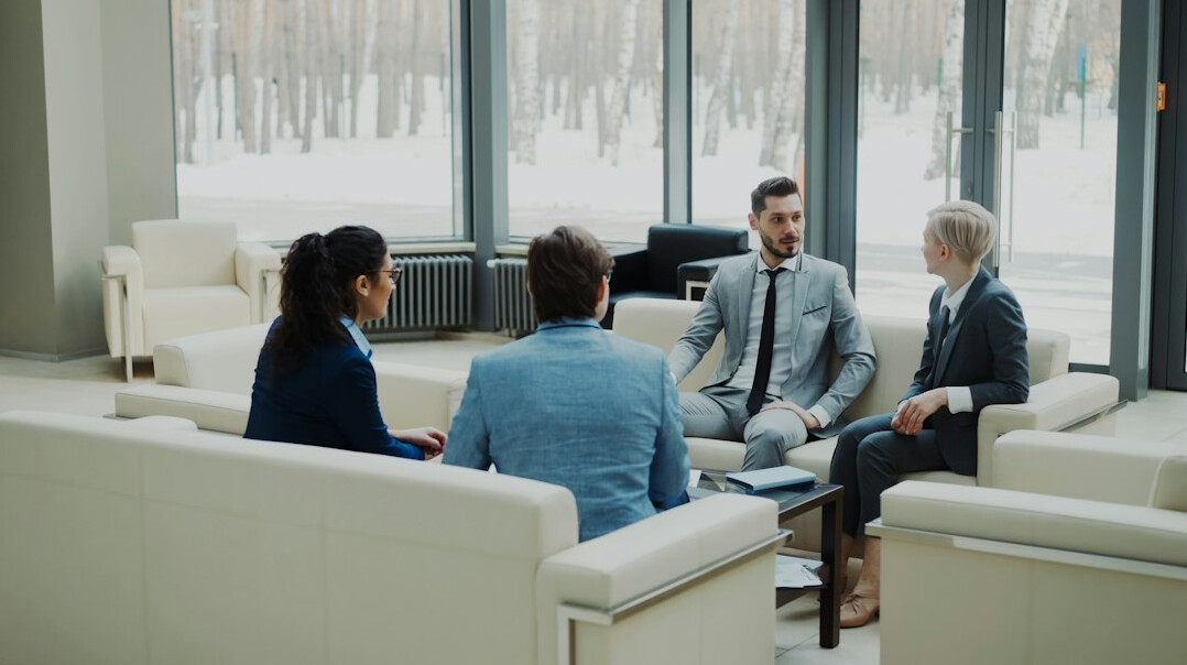 team discussing strategy in boardroom