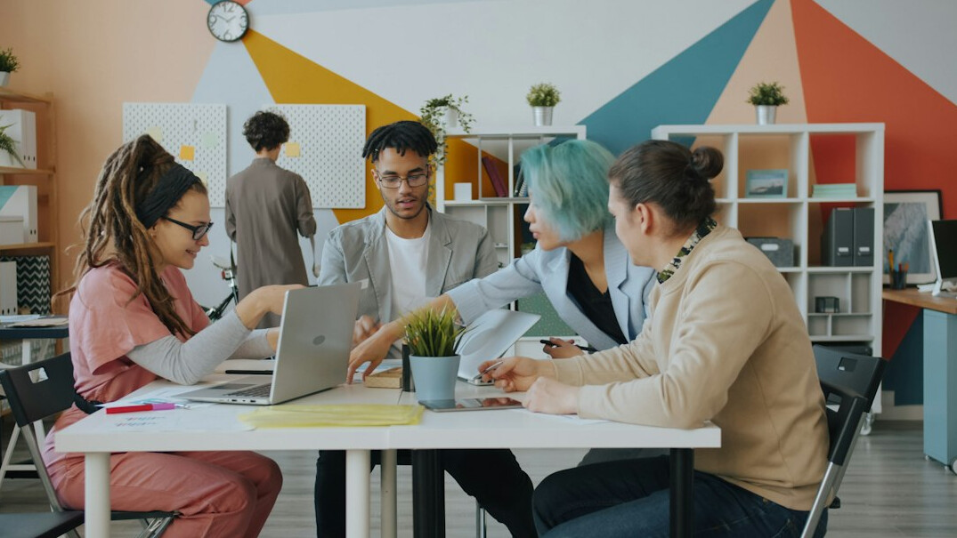 team collaborating in modern office