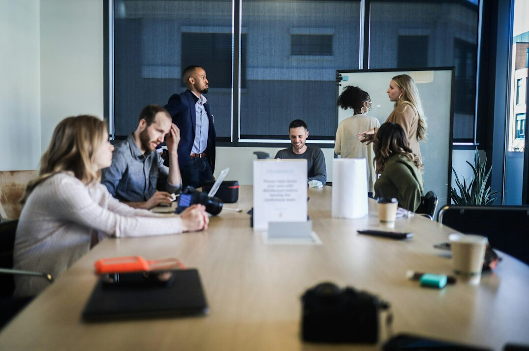 business professionals in meeting